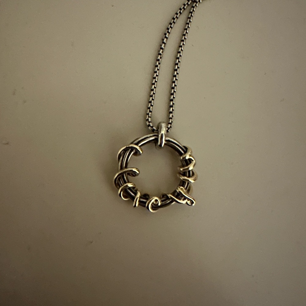 David Yurman necklace- says I love you. In silver and gold.